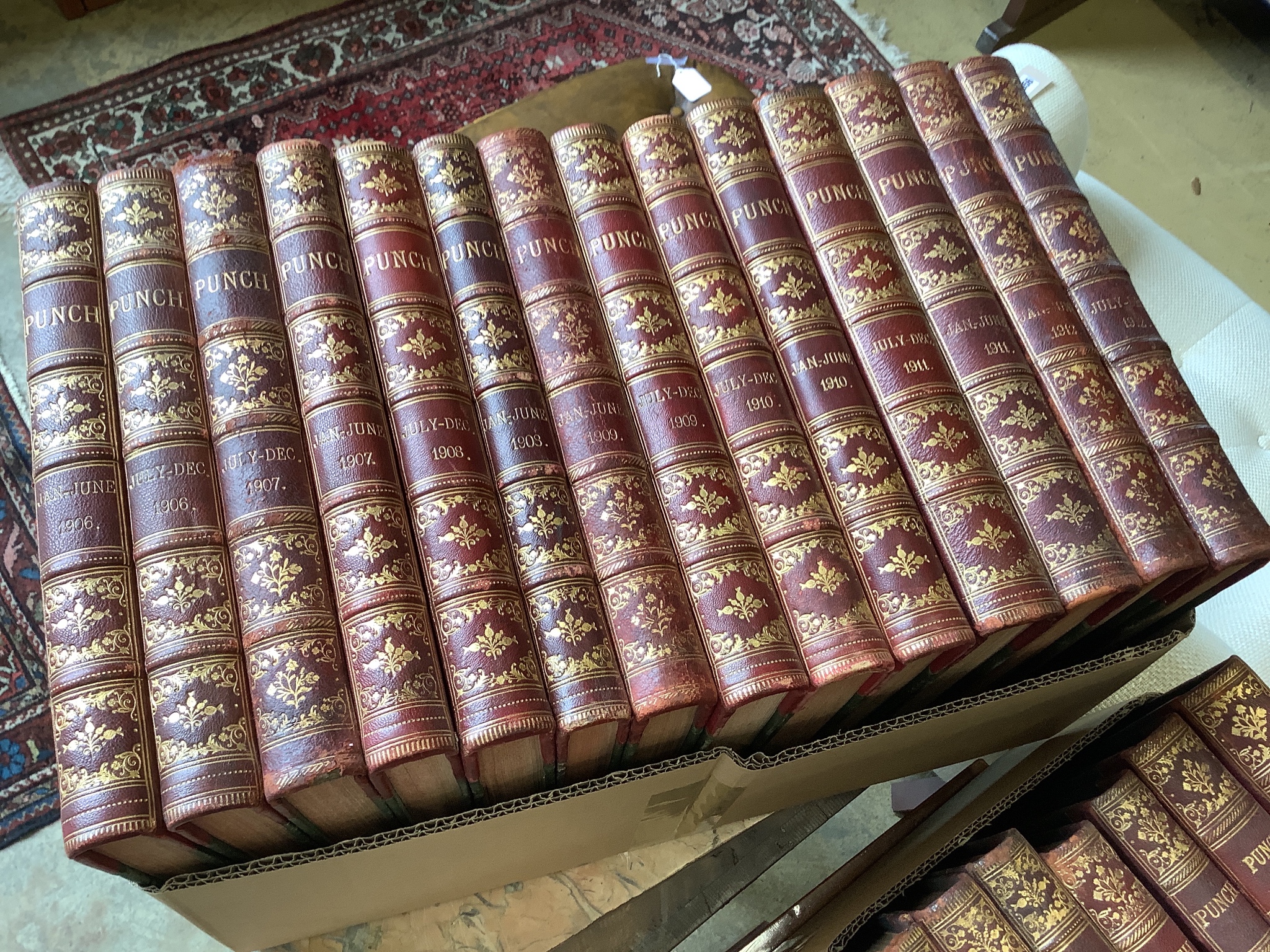 Punch Magazine January 1906 to June 1916, January 1917 to June 1938, January 1950 to June 1966 in 98 gilt tooled leather bindings